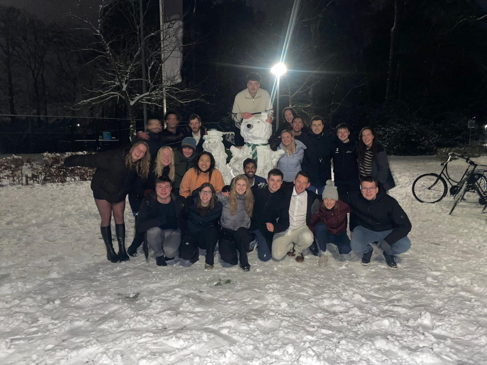 Drienerlo members together outside during a snowy club activity